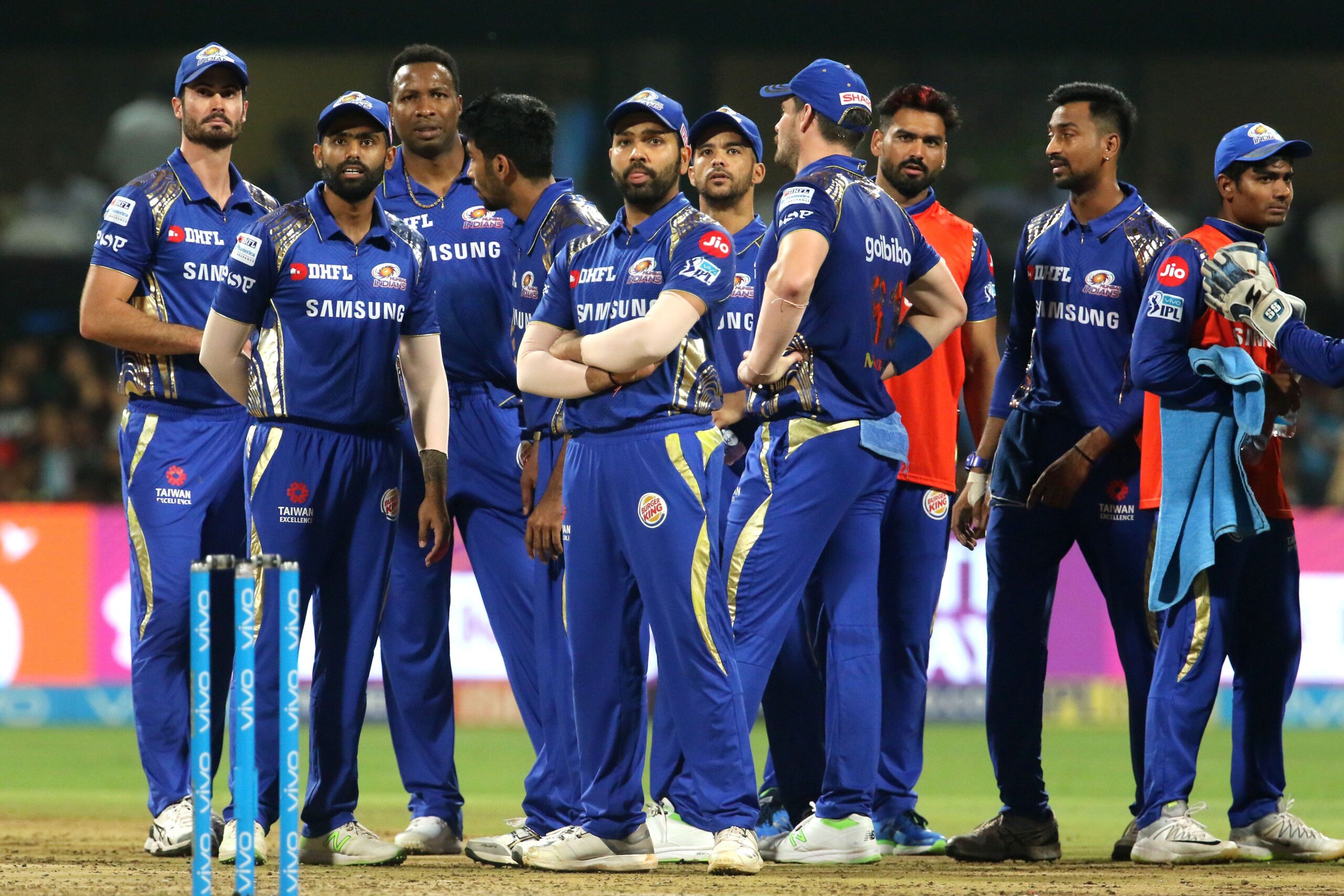 Jasprit Bumrah in Mumbai Indians jersey looking disappointed, IPL 2025 injury update.