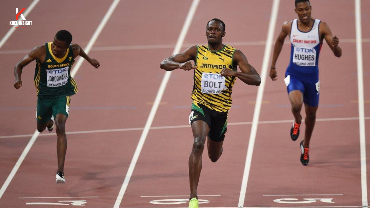 Usain Bolt running at event during India tour with cheering fans in background
